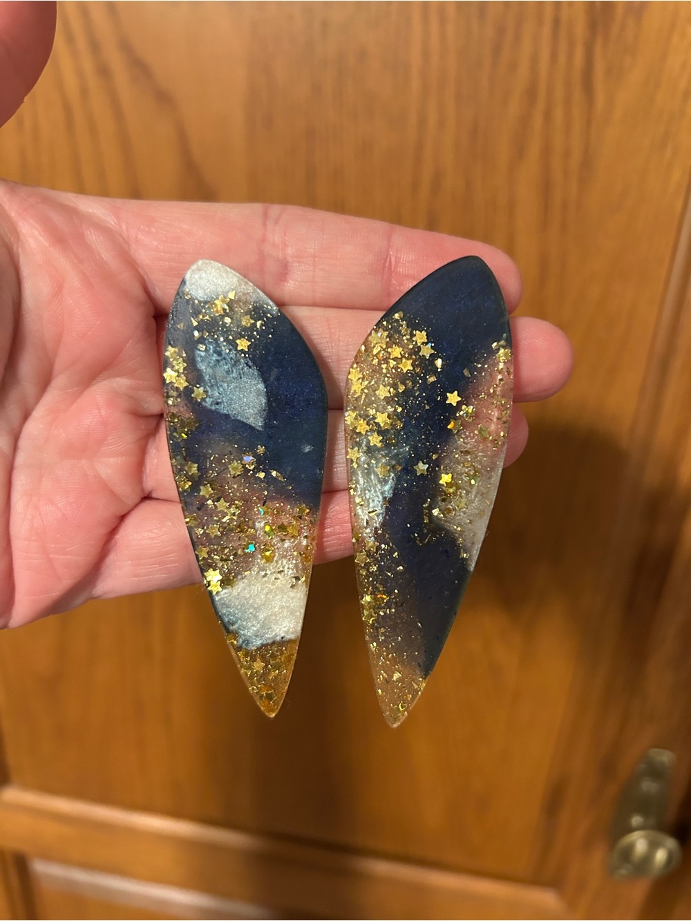 Handmade Blue, White, & Gold Starry Sparkly Resin Arrowhead Earrings